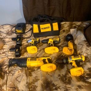 A regular drill, hammer drill , impact drill , sawzall , and flashlight
